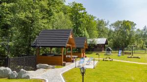 Κήπος έξω από το Domki Gawra z Jacuzzi