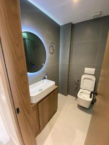 Koupelna v ubytování Velmar Hotel