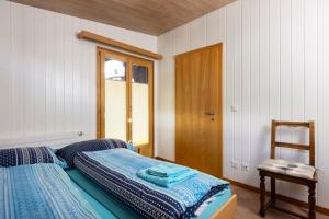 Postel nebo postele na pokoji v ubytování Apartment Chalet Diana