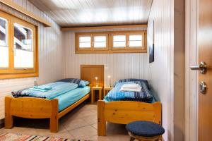 Postel nebo postele na pokoji v ubytování Apartment Chalet Diana