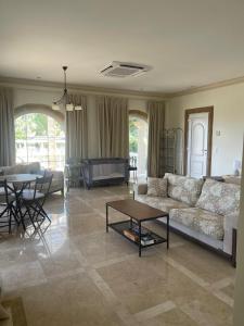 Χώρος καθιστικού στο Nostrana Village Apartments