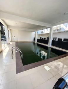 Πισίνα στο ή κοντά στο Care And Essential Apartment