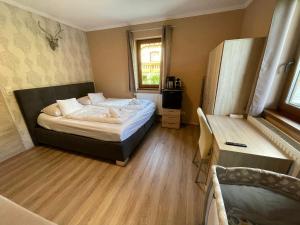 Postel nebo postele na pokoji v ubytování Nockalm Cottage