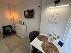 TV a/nebo společenská místnost v ubytování Apartment Coastal Feeling in Hercules Sea views + 13 fotografií