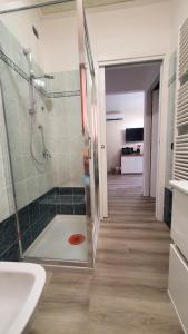 a bathroom with a shower and a sink at La Casa di Perla BILOCALE A 6 Kilometri da SALO' in Villanuova sul clisi +30 photos