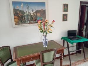 TV a/nebo společenská místnost v ubytování B&B Casetta Ninfa