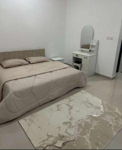 Letto o letti in una camera di غرف يومي مفروشة