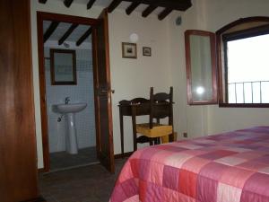 Posteľ alebo postele v izbe v ubytovaní Podere Il Caggio Rooms