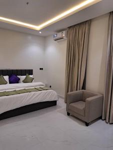 Ένα ή περισσότερα κρεβάτια σε δωμάτιο στο Luxury Apartment & Homes