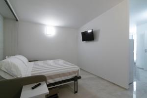 TV a/nebo společenská místnost v ubytování Residence Flow-R