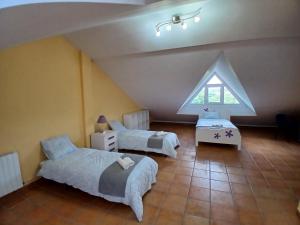 Postel nebo postele na pokoji v ubytování Merinna- Chalet piscina padel
