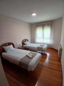 Postel nebo postele na pokoji v ubytování Merinna- Chalet piscina padel