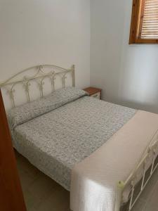 Postel nebo postele na pokoji v ubytování Casa Mareblu