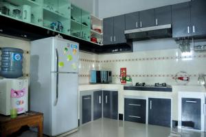 Kuchyň nebo kuchyňský kout v ubytování Shrine Guest House