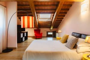 A bed or beds in a room at Tenuta Borgo Santa Cecilia