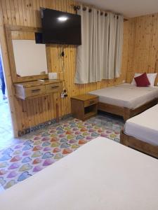Postel nebo postele na pokoji v ubytování Chillax Dahab