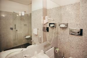 Koupelna v ubytování Hotel Porta Felice & Spa