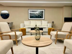 TV o dispositivi per l'intrattenimento presso HUNAB Roma Apt - Pool, Coworking and Gym NEW