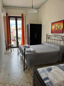 Ένα ή περισσότερα κρεβάτια σε δωμάτιο στο Jonia Apartments
