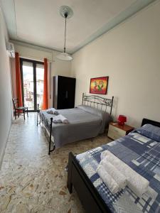 Ένα ή περισσότερα κρεβάτια σε δωμάτιο στο Jonia Apartments +57 φωτογραφίες