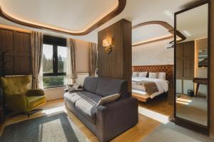 Letto o letti in una camera di Hotel Rezident