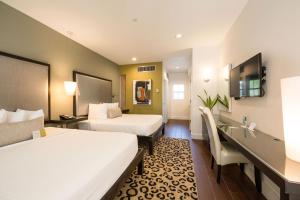 Letto o letti in una camera di Truman Hotel