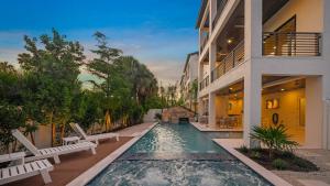 a swimming pool in the middle of a building at Salty Sunrise in Clearwater Beach