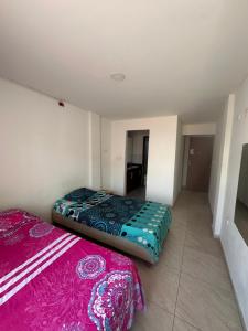 Postel nebo postele na pokoji v ubytování Casona La Española