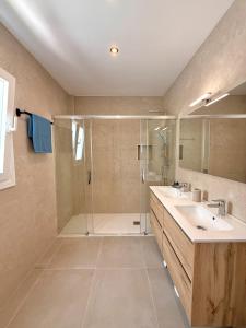 a bathroom with a shower and a sink at Villla Clementina in Nerja