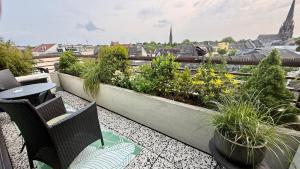 Balkón nebo terasa v ubytování BOSTEL 89 - Apartment, in der Altstadt, Klimaanlage, Aufzug