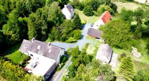 an aerial view of a house and a river at 6Bed-Sleeps12-GroupRetreat-YogaStudio-PetFriendly in Feugères +10 photos