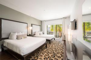 Letto o letti in una camera di Truman Hotel