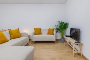 Oeiras Plazaにあるテレビまたはエンターテインメントセンター