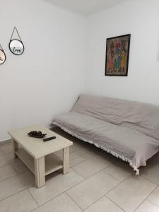 Ένα ή περισσότερα κρεβάτια σε δωμάτιο στο Cozy apartment near the center