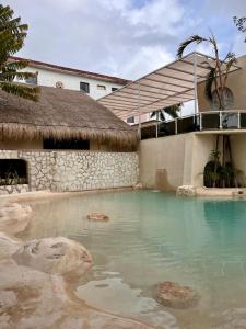 Bazén v ubytování Hotel Xbalamqué & Spa Cancún Centro nebo v jeho okolí