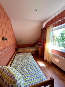 Postel nebo postele na pokoji v ubytování Lindaga
