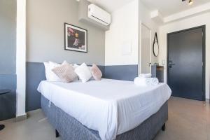 Postel nebo postele na pokoji v ubytování 360 Mirant Vila Madalena + 110 fotografií