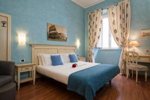 Postel nebo postele na pokoji v ubytování Navona Tower Relais