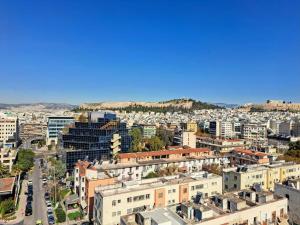 an aerial view of a city with buildings at Athens Pearl in Athens