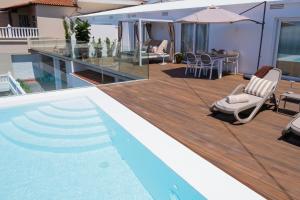 Bazén v ubytování La casa de Pascasio nebo v jeho okolí