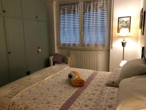 Postel nebo postele na pokoji v ubytování B&B Rosa