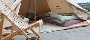 Postel nebo postele na pokoji v ubytování Glamping Casacocco'