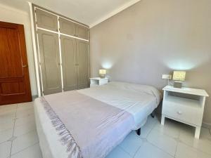 Posteľ alebo postele v izbe v ubytovaní Residencial puig rom