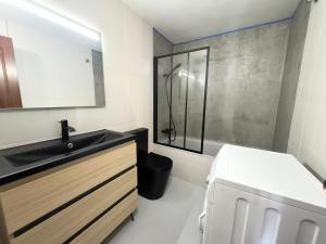 Kúpeľňa v ubytovaní Residencial puig rom
