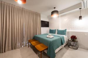 Postel nebo postele na pokoji v ubytování Rosemari's Apartments RP Deluxe Living