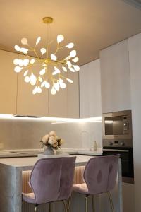 Kuchyň nebo kuchyňský kout v ubytování Квартира студия,с прямым видом на море! в Аркадии.На Каманина!