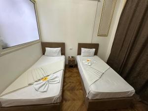 Postel nebo postele na pokoji v ubytování Bab el khair Hostel