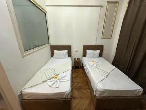 Postel nebo postele na pokoji v ubytování Bab el khair Hostel