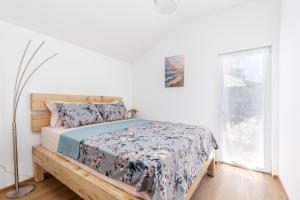 a bedroom with a bed and a window at House with Pool - Ratisevina in Herceg-Novi +56 photos