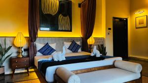 Postel nebo postele na pokoji v ubytování Foresta Resort Sigiriya